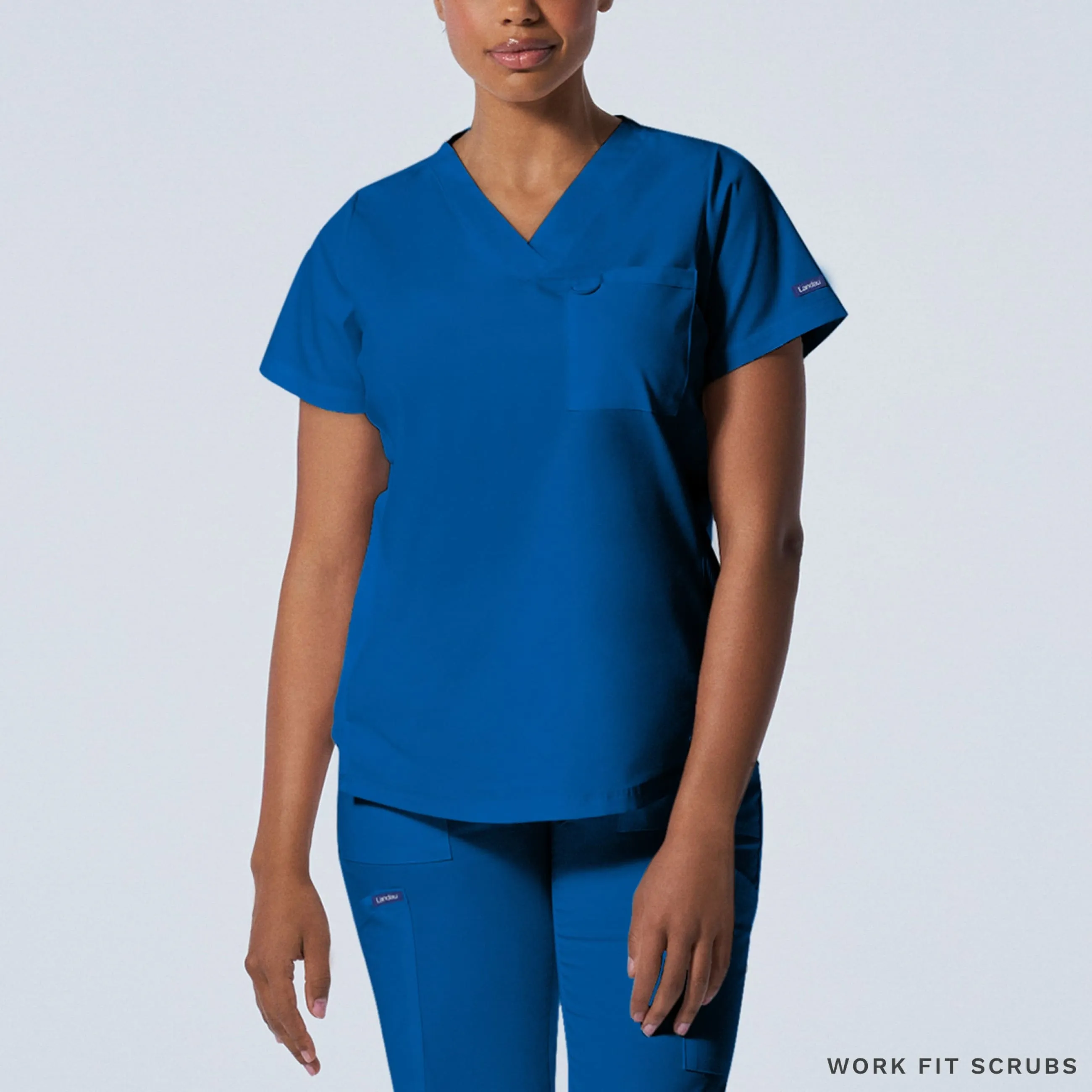 LT107 Landau Proflex V neck 2 Pocket top