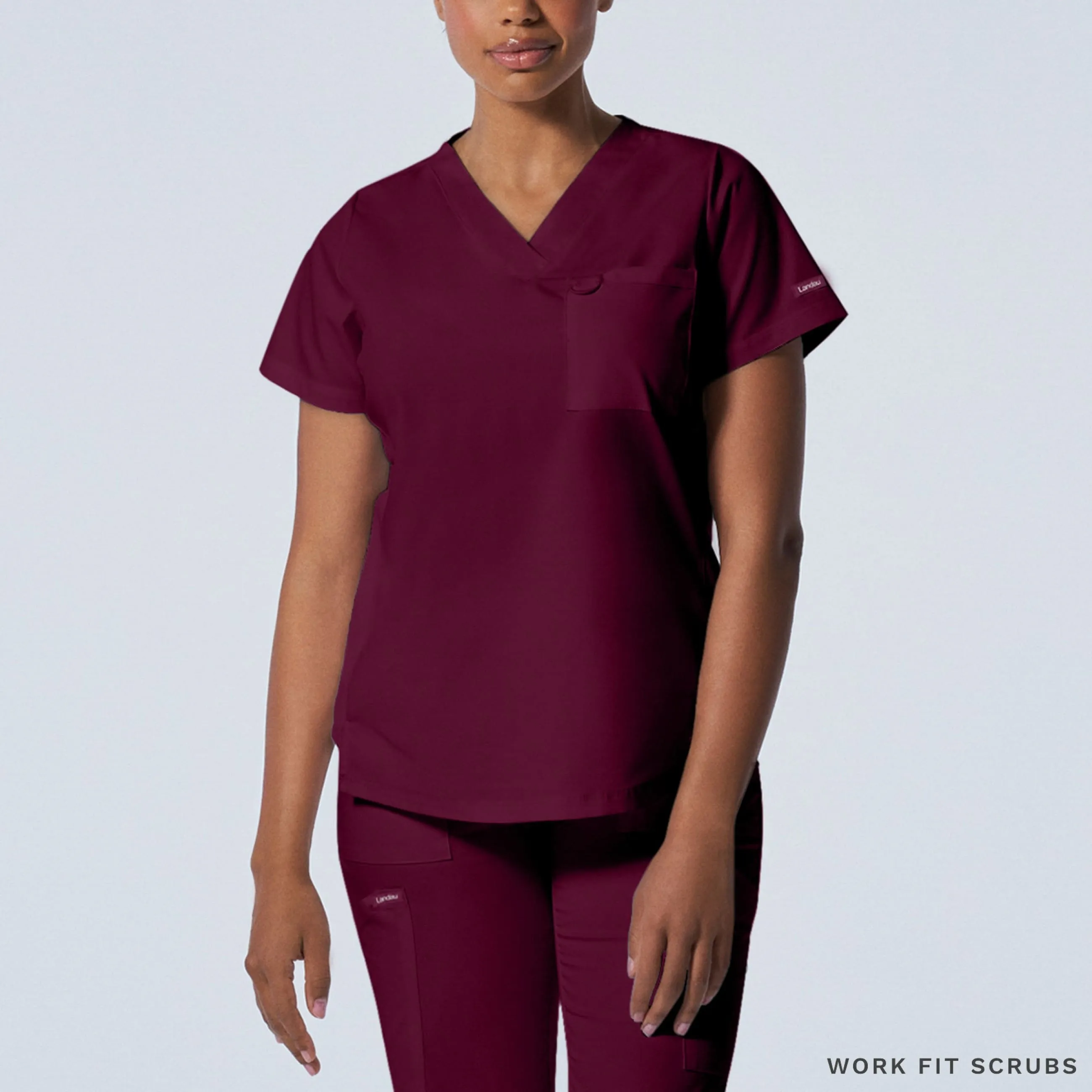 LT107 Landau Proflex V neck 2 Pocket top